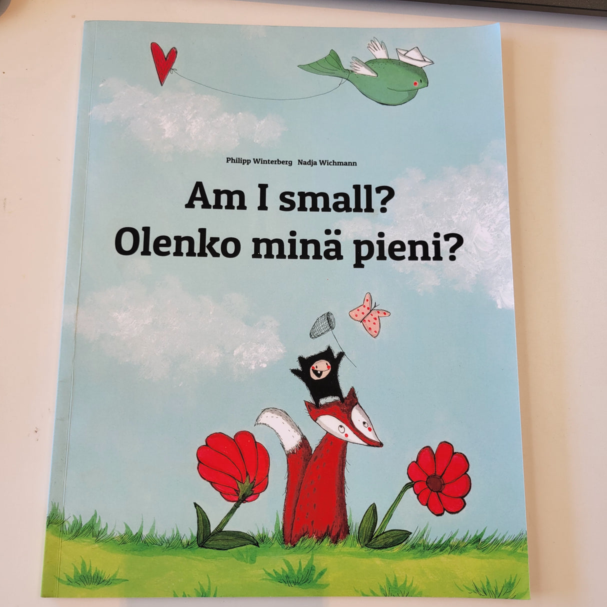 Am I small? Olenko mina pieni? Finnish text